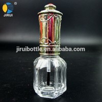 Glass empty nail polish bottle with crown cap and brush